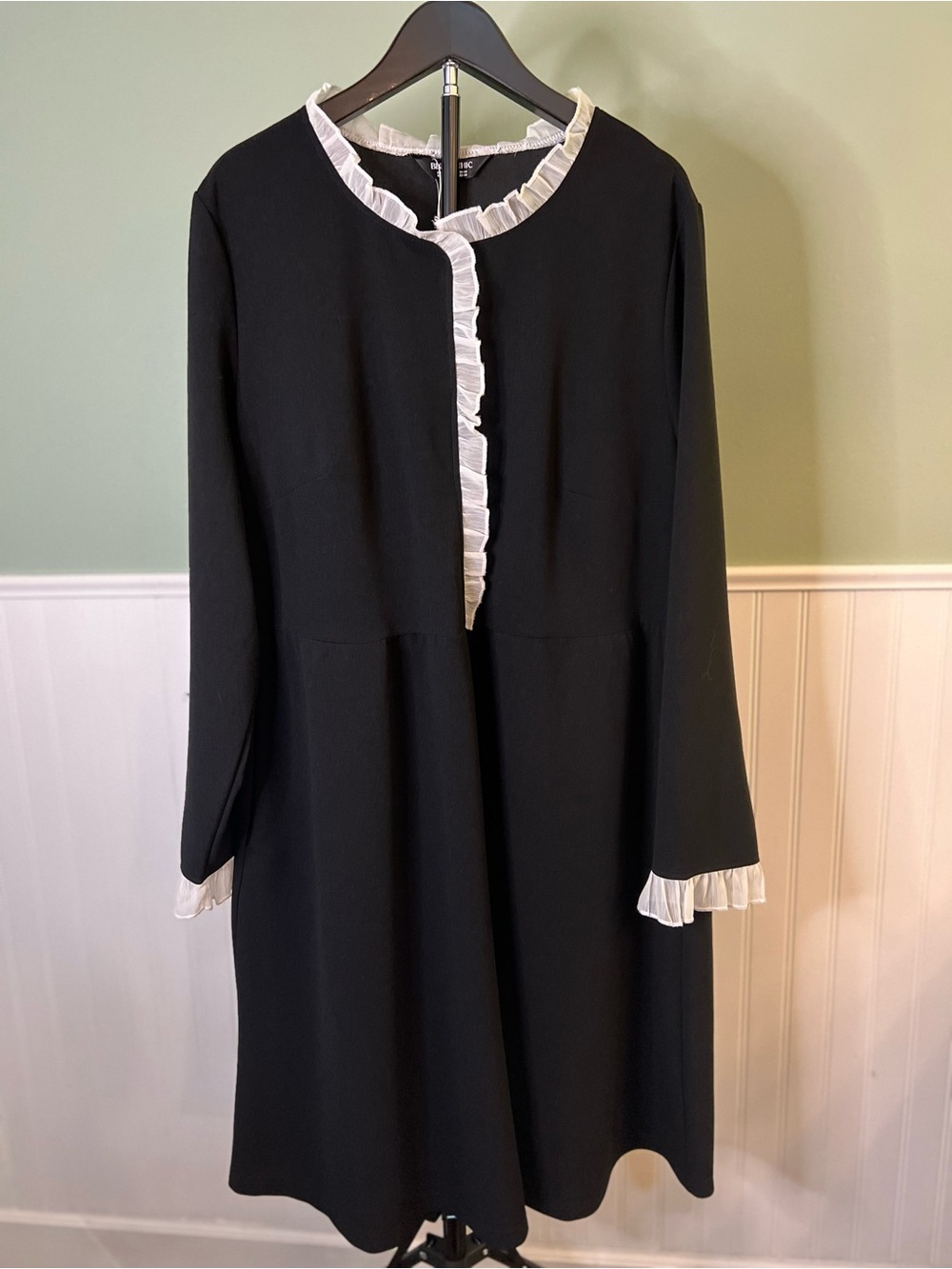 NWT- BloomChic Black Long Sleeve Dress with White Ruffle Trim. Size 18/20